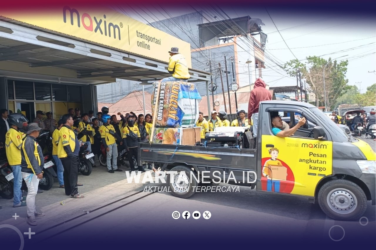 IMG-20261026-WA0050 Aksi damai dari ADOBSI Gorontalo di Kantor Maxim, Senin (26/10/2026). (Dok, Zie)